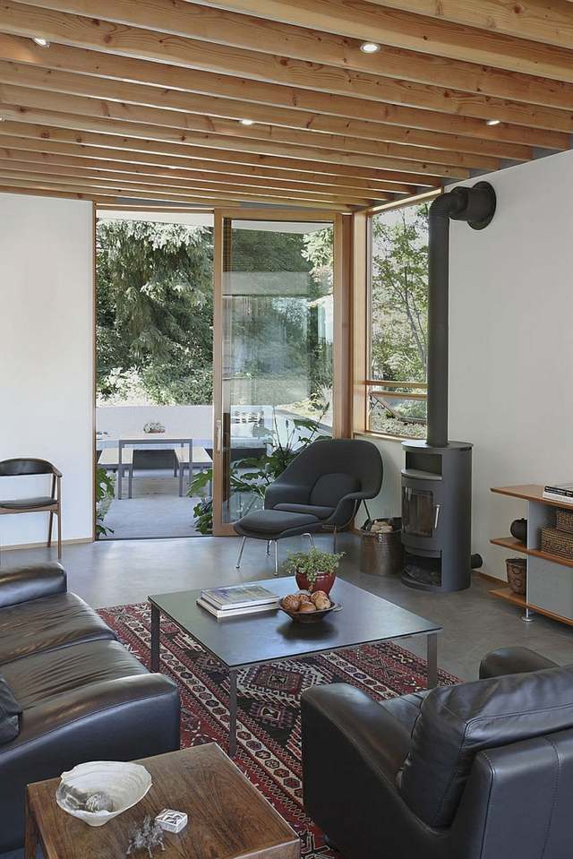 Väggar vardagsrum lantlig stil Kilim glasbord lädermöbler