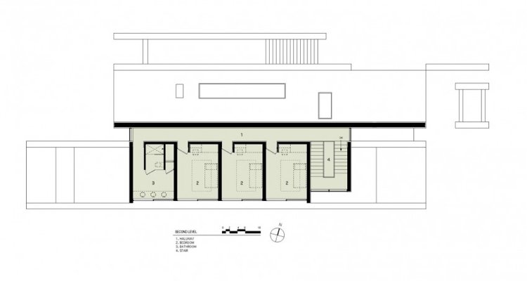 träbeklädnad-inuti-utsidan-minimalistisk-modernt-hus-andra-våningen-plan plan-sovrum