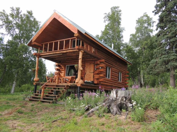 hydda gjord av trä alaska timmerstuga design romantisk