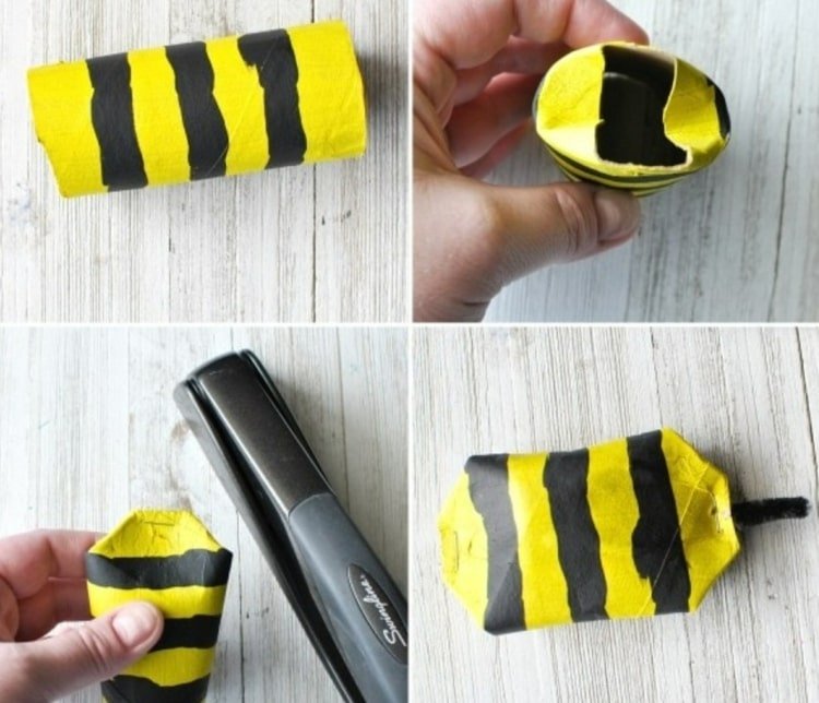 Måla toalettrullen gul och svart och forma ett bi