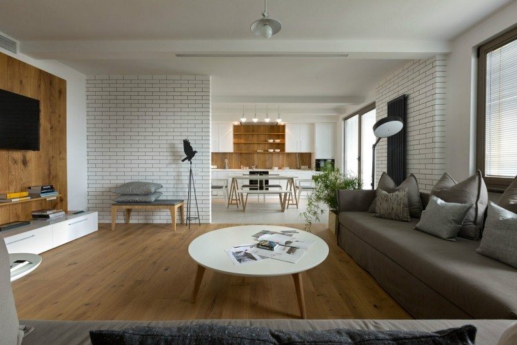 Idéer för vardagsrumsinredning modern-grå-soffor-trä-väggbeklädnad-tv-kök