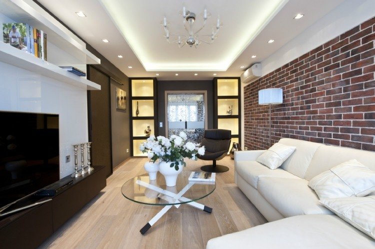 vardagsrumsmöbler-idéer-modern-indirekt-belysning-tak-tegel-vägg-vit hörnsoffa
