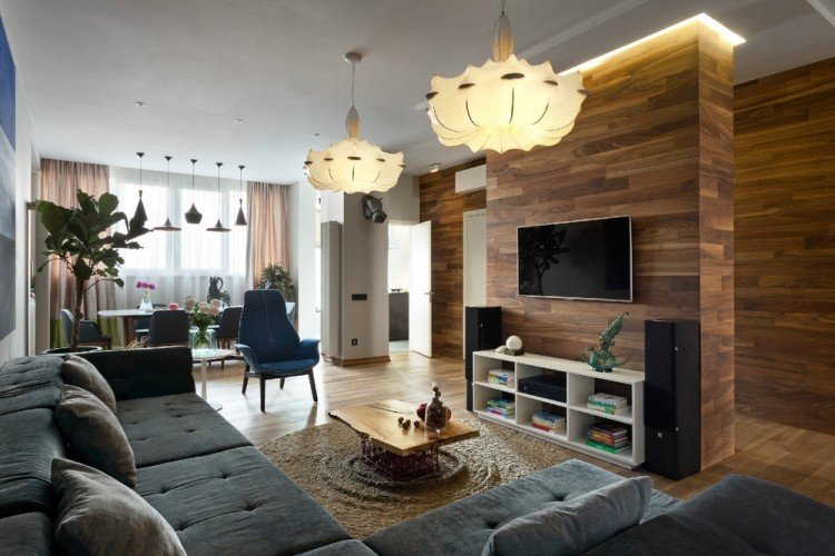 vardagsrum-idéer-modern-grå-hörn-soffa-trä-väggbeklädnad-matplats