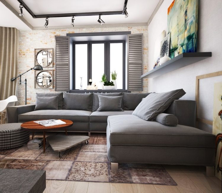 vardagsrumsmöbler-idéer-grå-hörn-soffa-exponerad-tegel-vägg