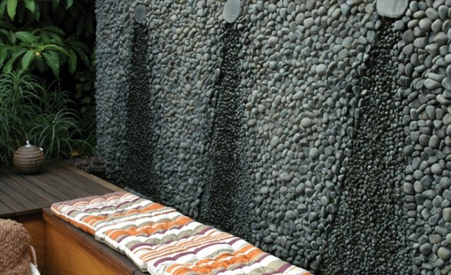 textur design modern trädgård design vägg svarta stenar deco