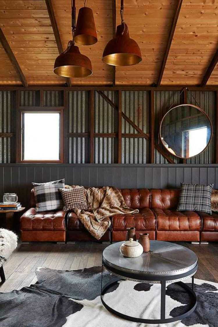 vardagsrum soffbord metall läder soffa industriell design hängande lampor