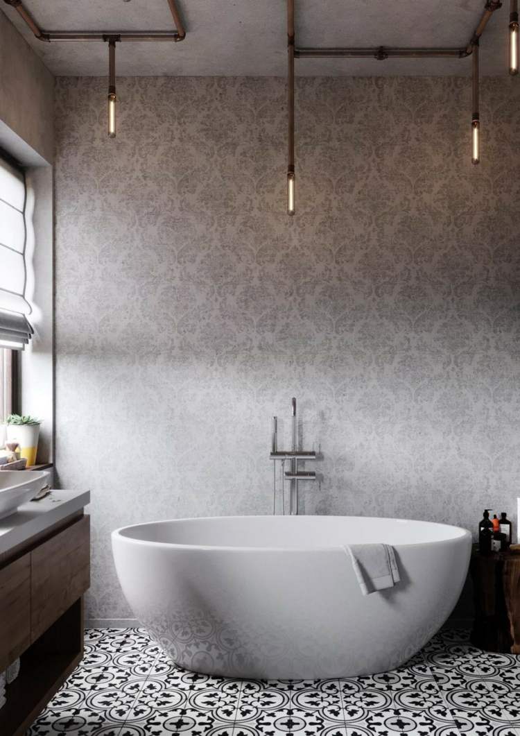 badrum badkar oval vägg design tak betong lampor industriell design