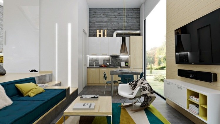 industriell design-möbler-tv-vägg-matta-turkos-senap-gul-fåtölj-soffa-kök-liten lägenhet