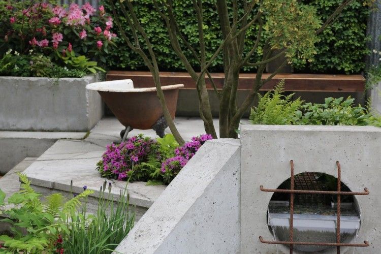 industriellt utseende trädgård design idéer tips järn betong kombination