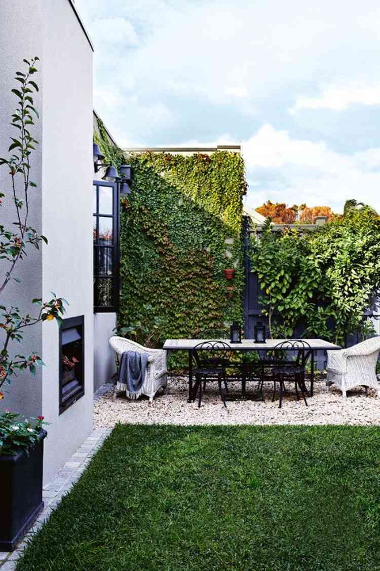 industriellt utseende trädgård designidéer tips kombination mysig bakgård vintergröna