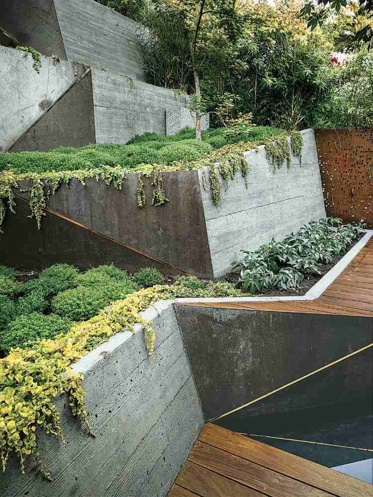 industri look trädgårdsdesign idéer kombination betongsteg växter