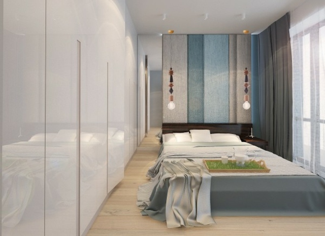 3-garderob-i-vit-wroslaw-lägenhet-med-ombré-blå-i-sov-området