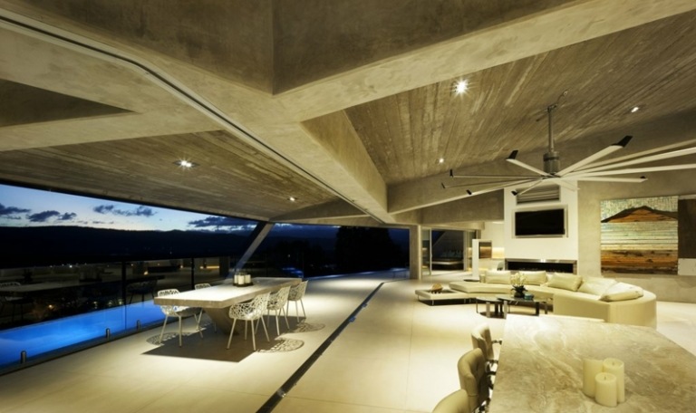 interiör av betong och granit vardagsrum matbord terrass tak design