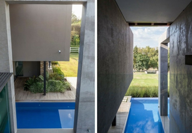 hus av naturmaterial betongväggar poolbuskar mycket