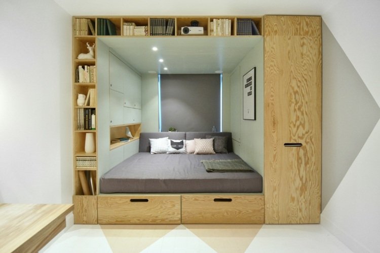 säng multifunktionella ungdomsrum grå design hyllböcker