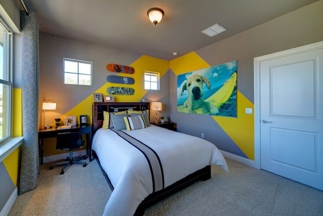 ungdomsrum-design-grå-gul-vägg-dekoration-skateboards-målningar