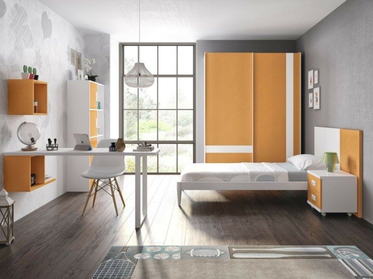 Vitt grått och gult för ett trendigt ungdomsrum med ett skrivbord som rumsavdelare