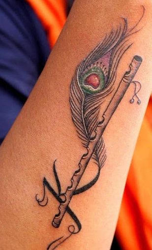 K Letter Tattoo With A Flute