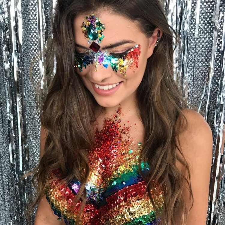 regnbågsfärger karnevalsmink glitter strass paljetter kvinna