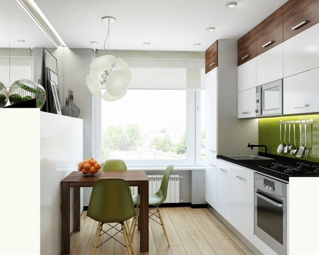 litet-kök-vitt-stänk-skydd-glas-grönt-vägg-målar-grått