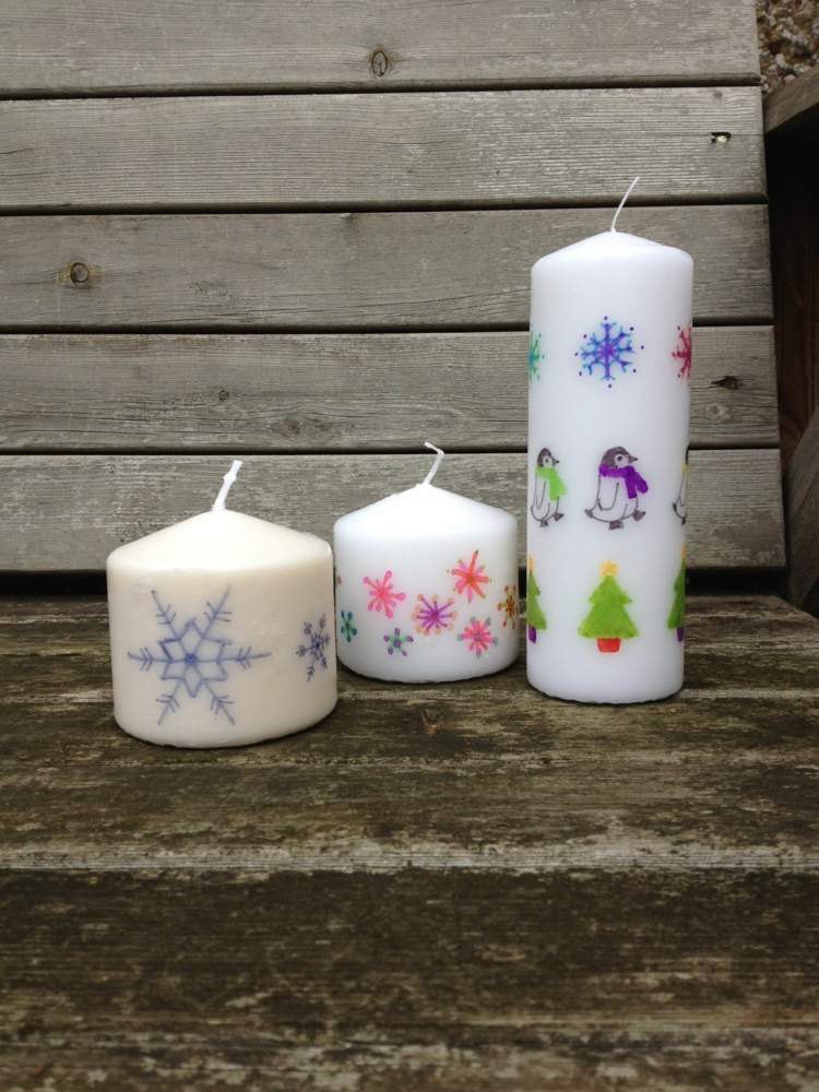 vinterhantverksprojekt ljus dekorera julmotiv snöflingor pingviner granar