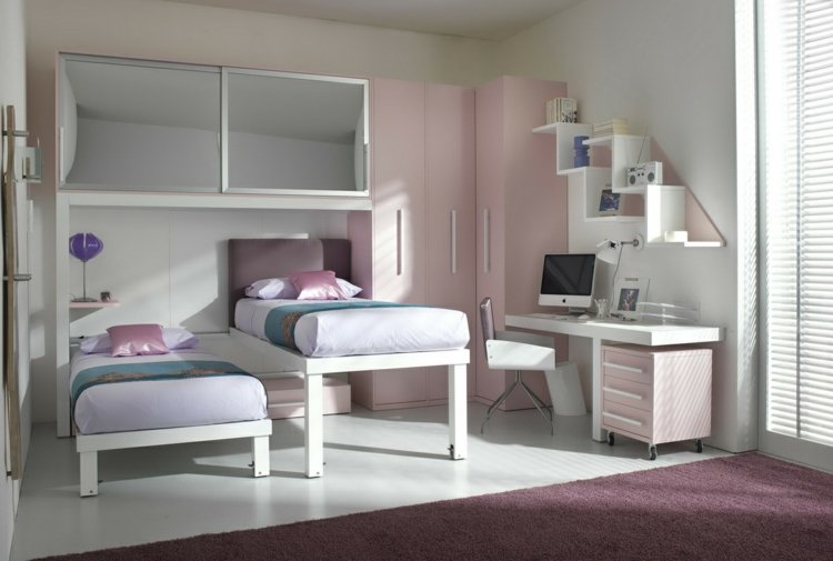 Barnrum-för-två-möblering-förvaringsutrymme-rulla-sängar-arbetsplats-bokhylla-vit-rosa