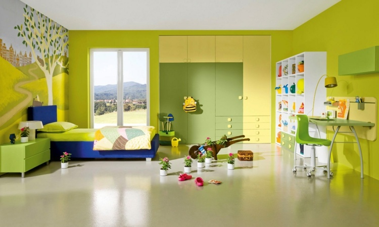 Barnkammardesign grön vägg blå sängram garderob skrivbord