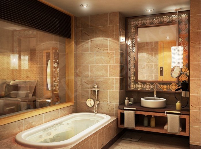 varm atmosfär badrum beige kakel badkar handfat spegel
