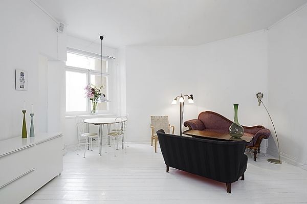 Interiör idéer puristiska vita väggar vintage möbler vardagsrum design