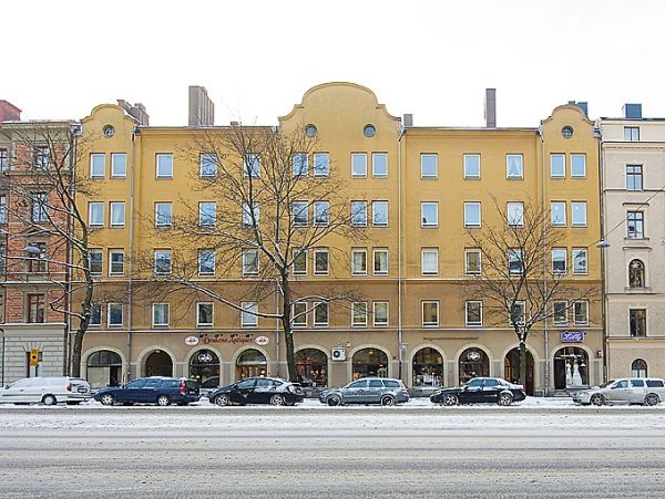Exteriörsbyggnad Stockholm liten vit lägenhet
