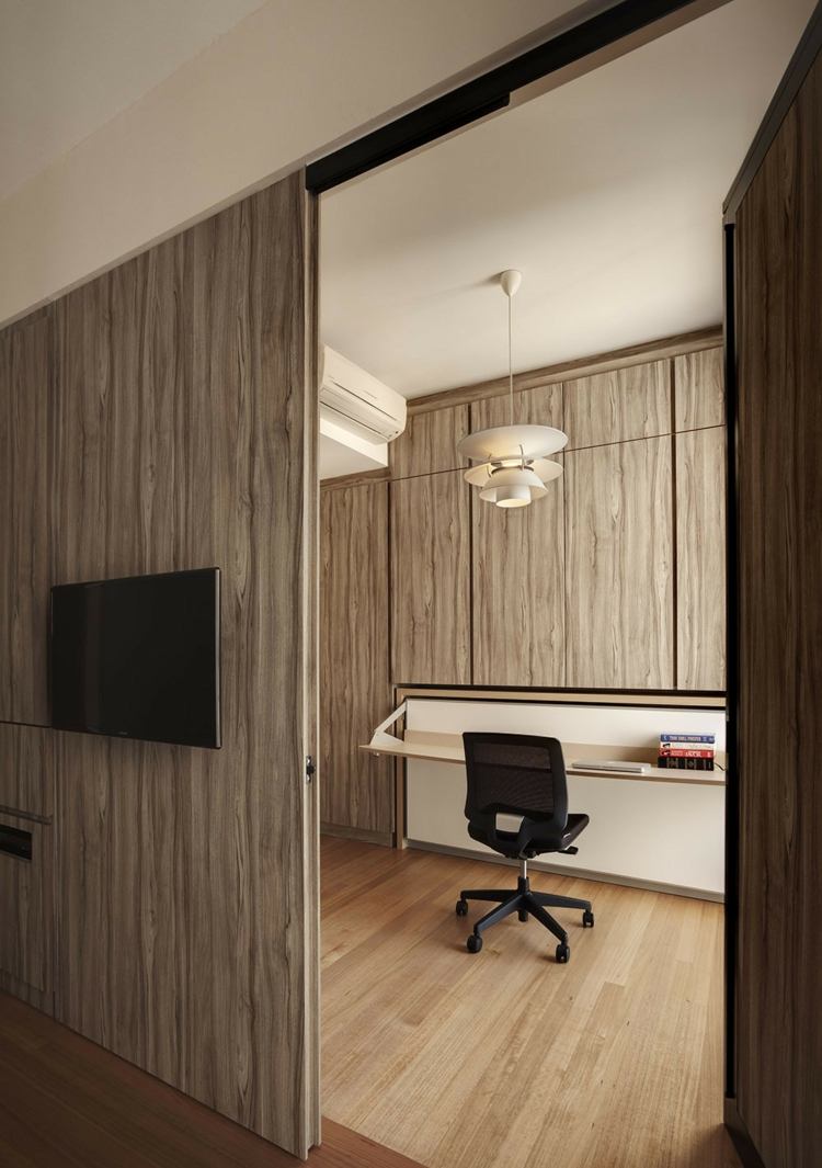 liten lägenhet-möblering-studie-platsbesparande-skrivbord-trä-skåp-fronter-vägg-fällbara skåp