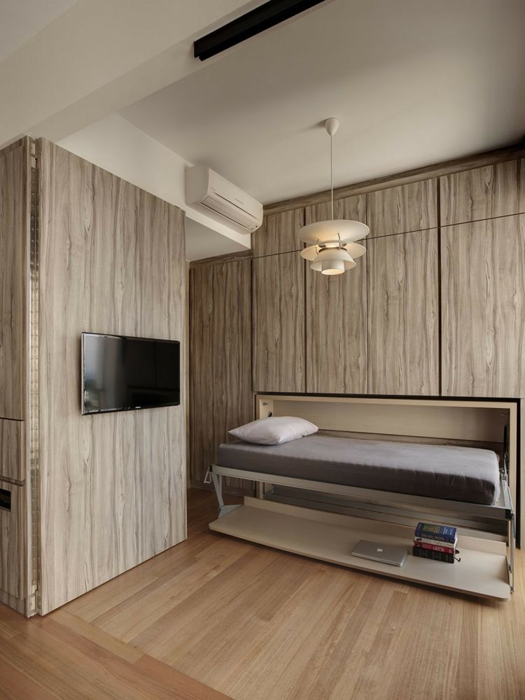 liten-lägenhet-inredning-sovrum-plats-besparande-säng-garderob-säng-trä-väggpaneler