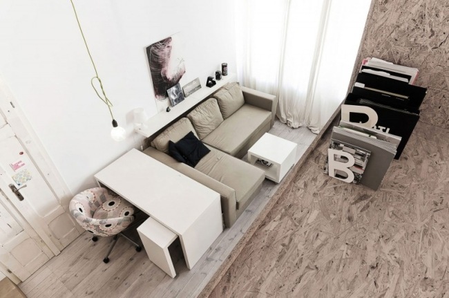 Liten lägenhet möbler vardagsrum skrivbord hörnsoffa