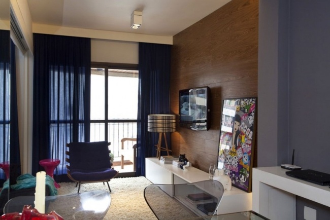 Liten lägenhet idéer vardagsrum mattor trä väggbeklädnad fåtölj design