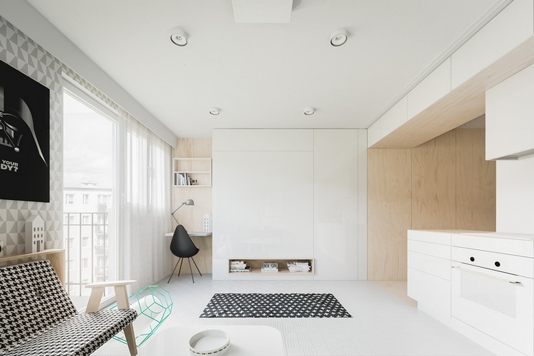 Inred små lägenheter ett-rums-lägenhet-garderob-säng-ljus-ton-geometriska-motiv