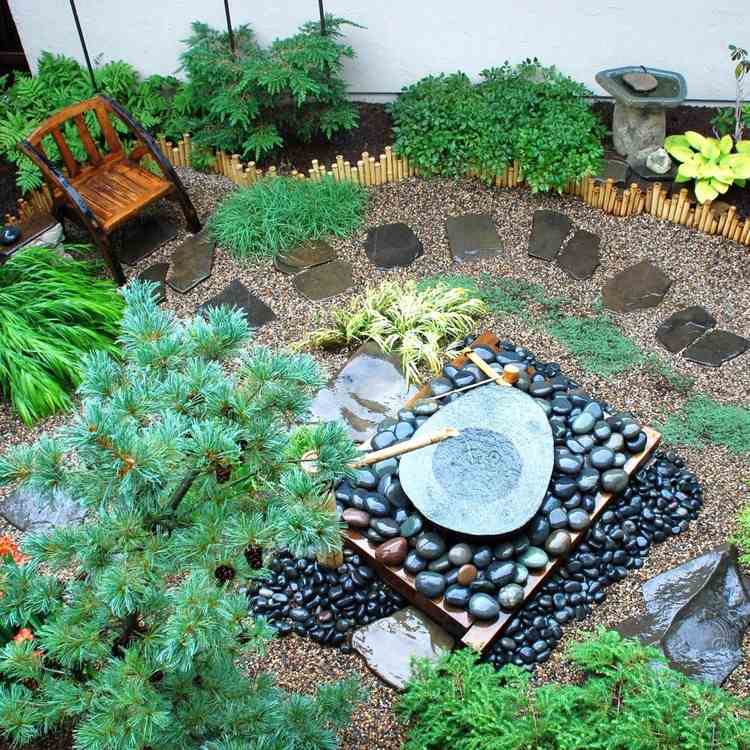 liten japansk trädgårdsinspiration moderna vattenspirala planteringsstenar