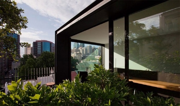 litet hus design grön arkitektur takterrass