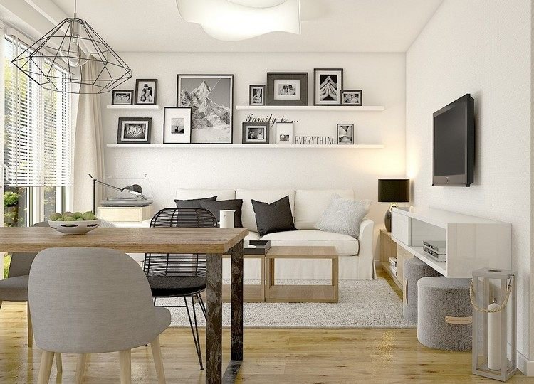 litet-vardagsrum-matsal-trä-golv-vägg-bild-gjutning-vit-soffa-vägg-tv