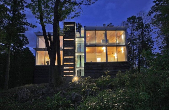 Eco house Hållbar byggnad på natten Travis Price-Architect USA