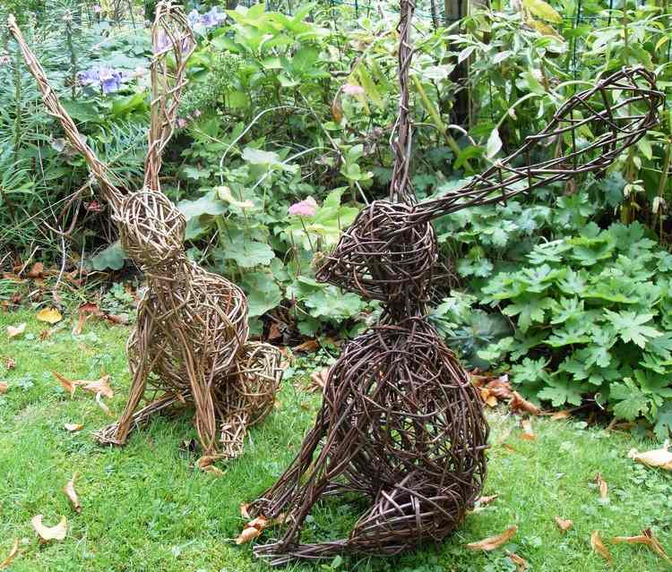 Trädgårdsskulpturer pil-kaniner-ljus-mörka
