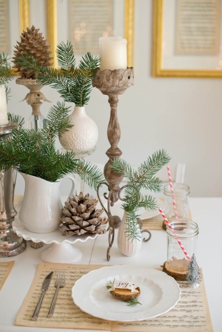 bordsdekoration-jul-gör-det-själv-naturmaterial-grangrenar-kottar-porslin-vita