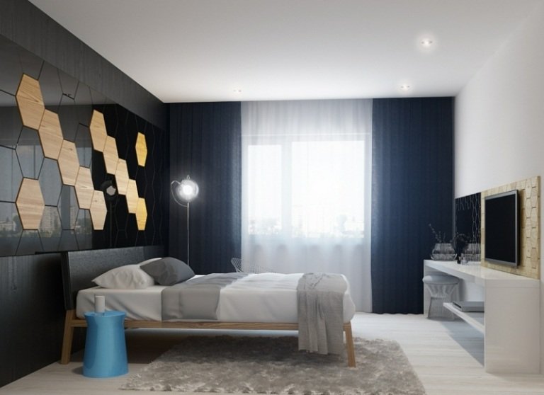 väggdesign i sovrummet geometrisk design svart guld bikaka
