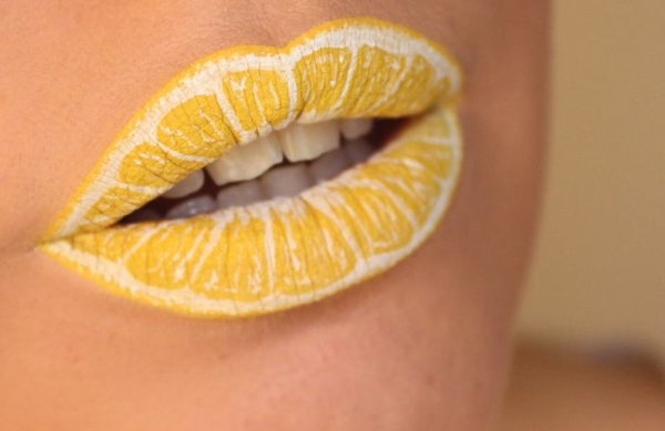 Kreativ färg orange läppstift bit