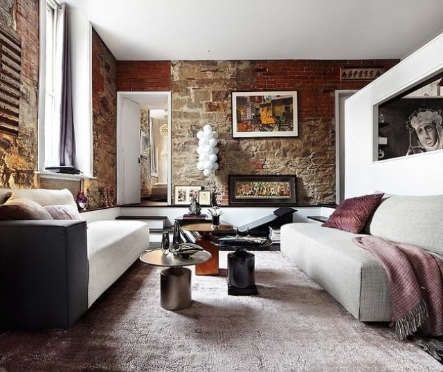 Rustikt vägg tegel loft lägenhet design vardagsrum inrättade soffbord