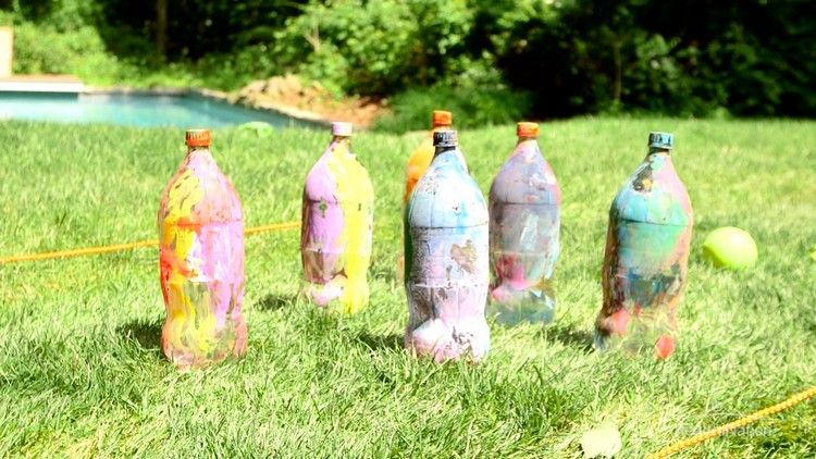 barnspel-trädgård-bowling-dreuss-lek-målade-flaskor-käglor-rep