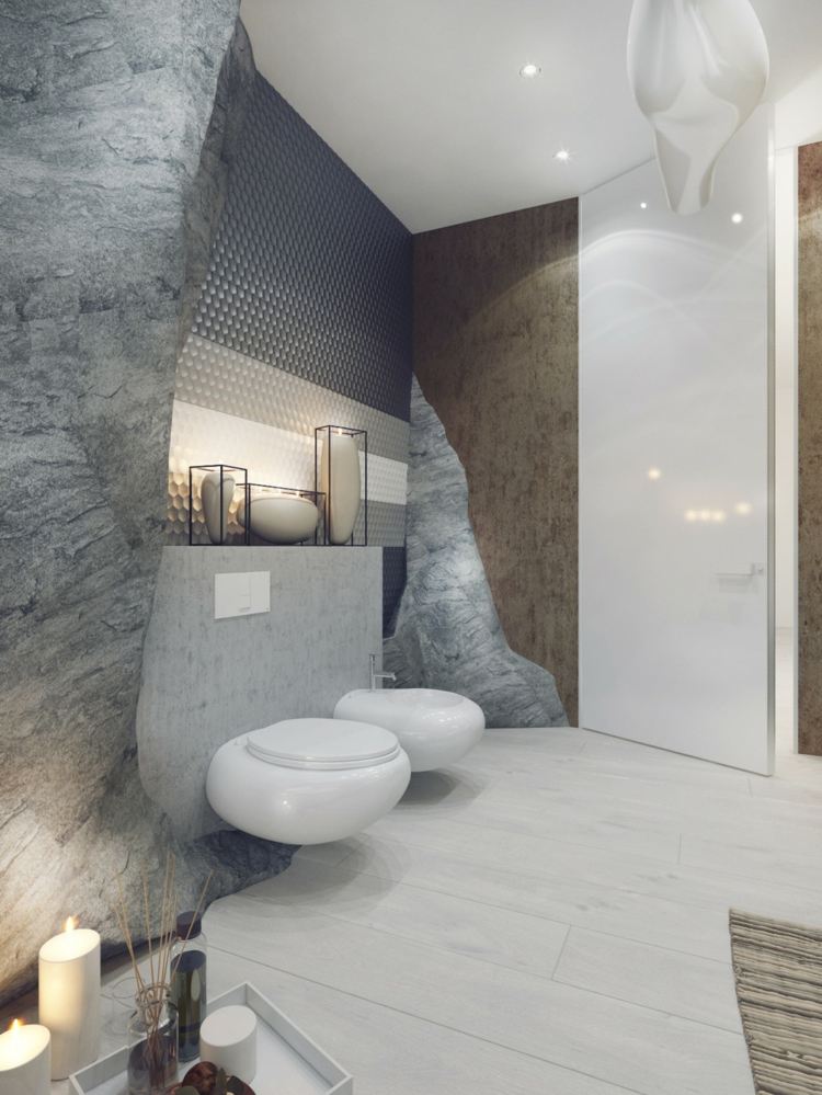 badrum lyxig toalett rund kakel grå stenar natur
