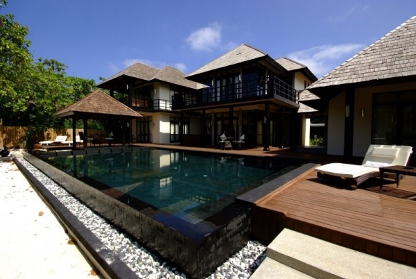 maldiverna lyxhotell iruvili exotisk arkitektur anläggning pool