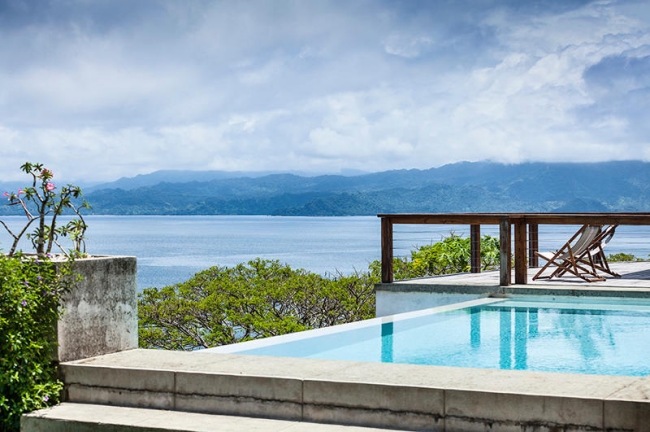 Betongvilla utomhuspool komplex utsikt panoramautsikt över havet pacific resmål