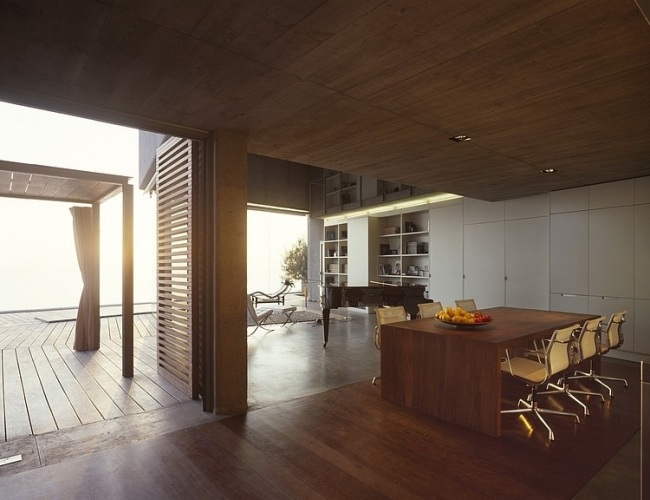 Residence moderna träbetong-glas konstruktion glasrutor-matsal öppna-vardagsrum-caa-arkitekter