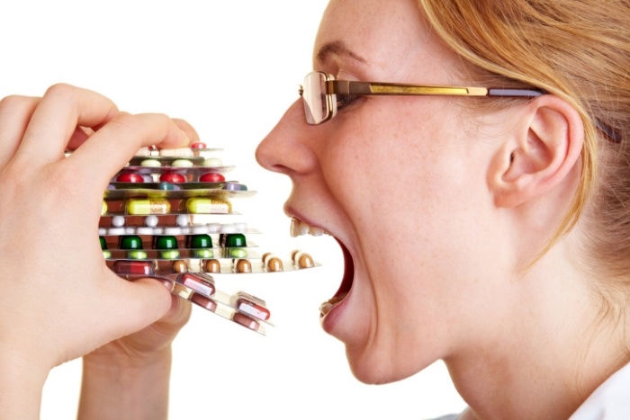 kvinna-tabletter-piller-hälsa-gastrointestinal influensakur